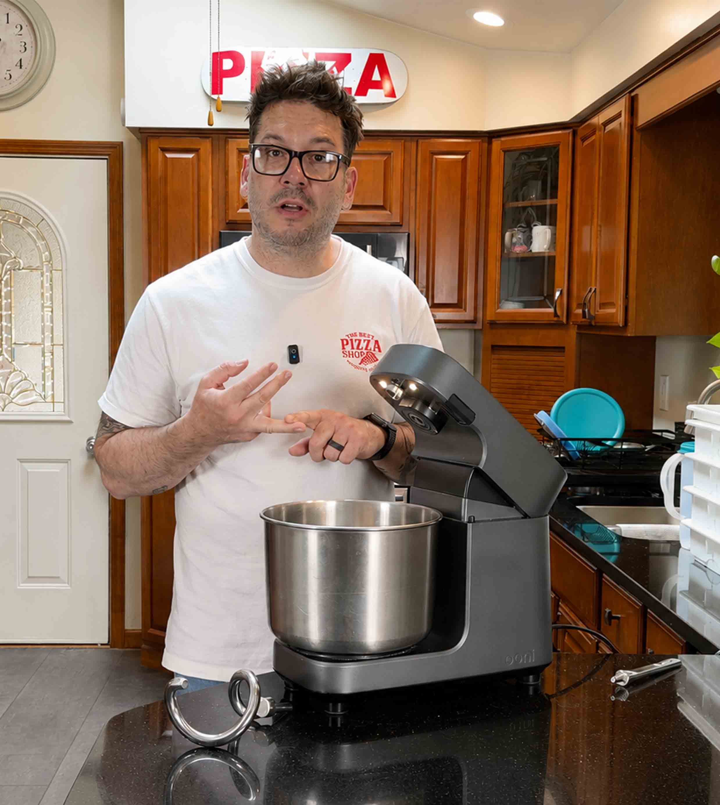 Jesse Wisinski testing pizza dough and equipment